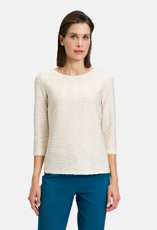 women's tops for those who want to stay on top of the latest fashion trends and wear pieces that are both stylish and on-trendTextured Top